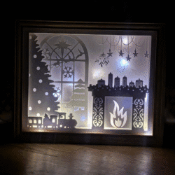 Lightbox en papier : Scène de Noël au coin du feu